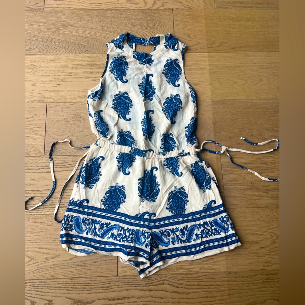 Blue and cream colored romper